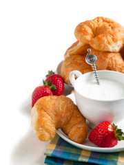 Breakfast with coffee and fresh croissants