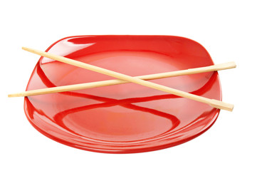 Red plate with chinese sticks