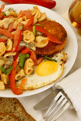 Pasta with vegetables and eggs.