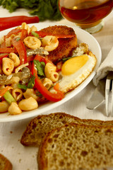 Pasta with vegetables and egg.