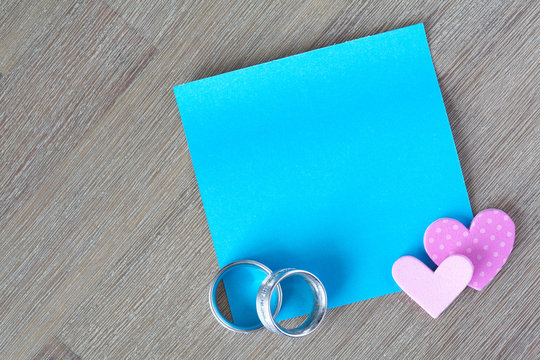 Blue Post It Note With Little Hearts And Wedding Ring