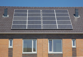 Fototapeta premium new family building with solar panels