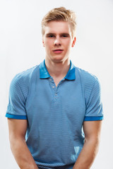 Obraz premium Young handsome blond man wearing shirt