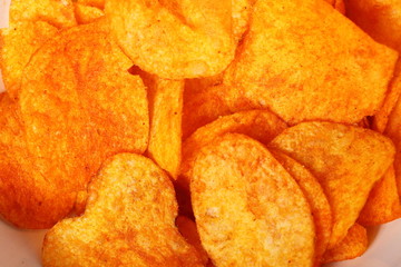 Close up potato paprika chips as background