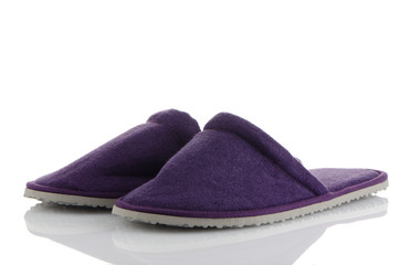 A pair of purple slippers
