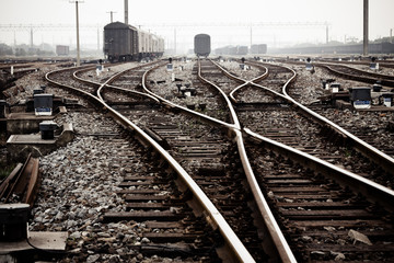 Obraz premium Railway in fog on station, outdoor landscape