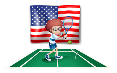 A tennis player in front of the USA flag