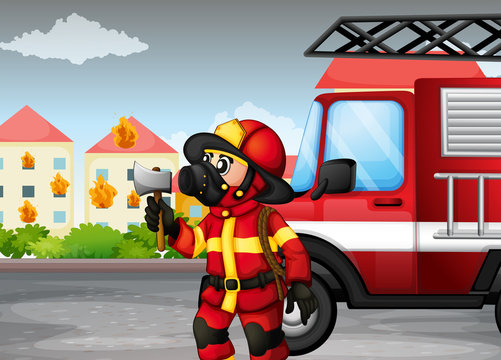 A fireman holding an axe with a truck at the back