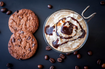 Whipped cream with chocolate sauce and chocolate chip cookies