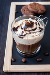Coffee with whipped cream  on the chalk board slate