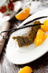 piece of poppy seed cake with orange zest
