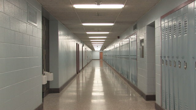 Highschool hallway. Slow zoom.