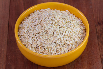 oat flakes in yellow bowl