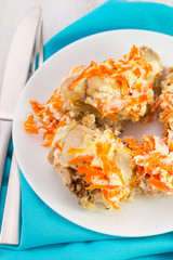 rabbit with carrot on plate with fork and knife
