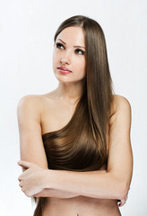Naklejka premium Beautiful Woman with Healthy Long Hair