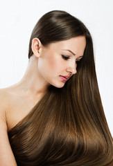 Naklejka premium Beautiful Woman with Healthy Long Hair