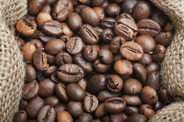 closeup coffee beans in jute bag