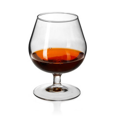 Glass of cognac on on white background