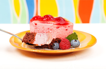 Raspberry yoghurt cake garnished with berries