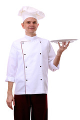 Portrait of chef holding tray on his palm isolated on white