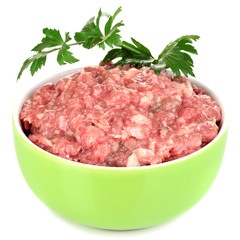 Bowl of raw ground meat isolated on white