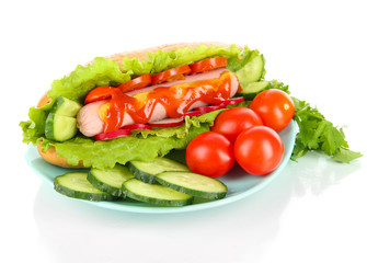 Tasty hot dog with vegetables isolated on white
