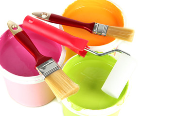 Set for painting: paint pots, brushes, paint-roller isolated