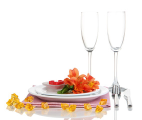 Festive table setting with flowers isolated on white