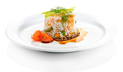 Delicious risotto with vegetables, isolated on white