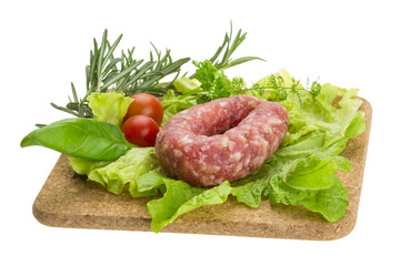 Salami with rosemary, salad and tomatoes