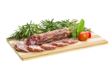 Salami with rosemary, basil and tomato