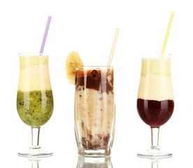 Delicious fruit smoothies isolated on white