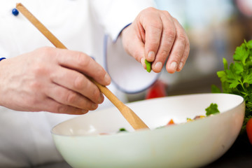 Chef preparing a salad