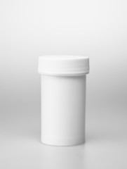 Small white medecine bottle