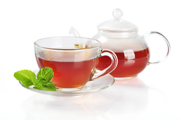 Cup of tea with teapot