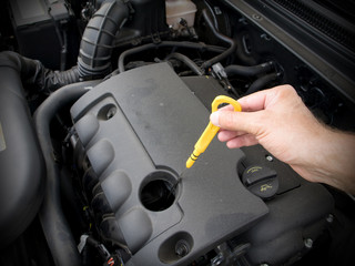 check the oil level in engine