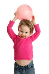 Young girl holding ball showing navel