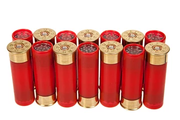 Fototapeten red hunting cartridges on a white background © denisk999