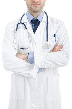 Confident male doctor, arms crossed