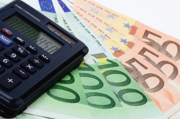 Taschenrechner mit Geld - Finanzvergleich