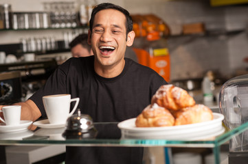 Happy staff at restaurant