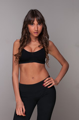 Fototapeta na wymiar Beautiful healthy fitness woman posing