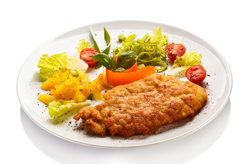 Fried pork chop and vegetable salad