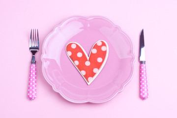 heart shape on a plate and fork,knife