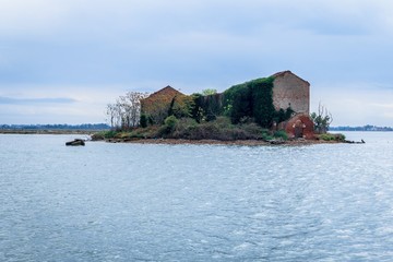 Abandoned ruins in a small island at the venetian lagoon