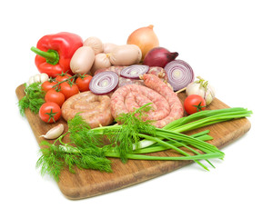 sausage and vegetables on a white background