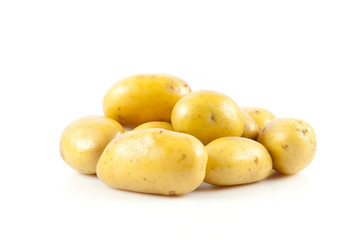 Fresh potatoes on a white background.
