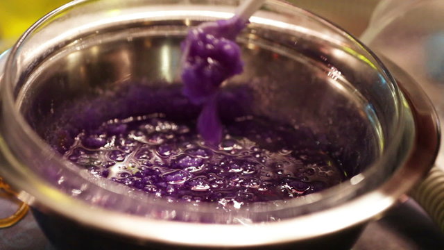 Mixing blue thick liquid