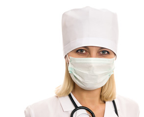 Portrait of a woman doctor in the mask on a white background