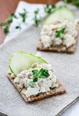 Smoked mackerel pate with herbs on crisp bread